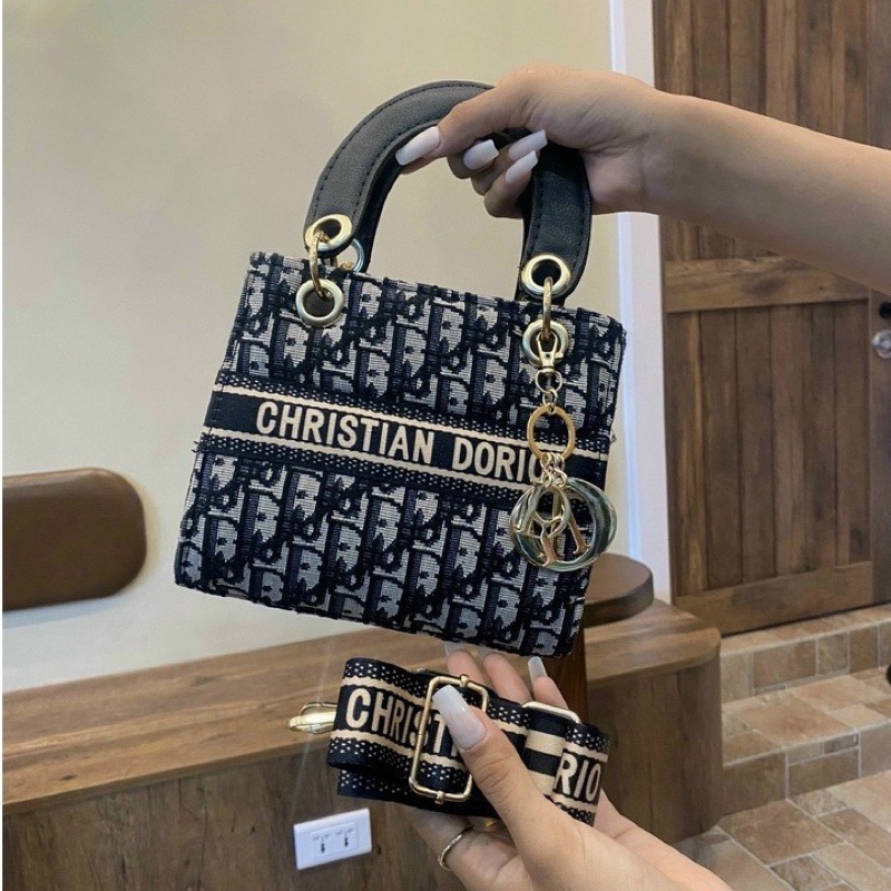 Túi đeo chéo, túi xách tay DIO THỔ CẨM PK vàng T1600