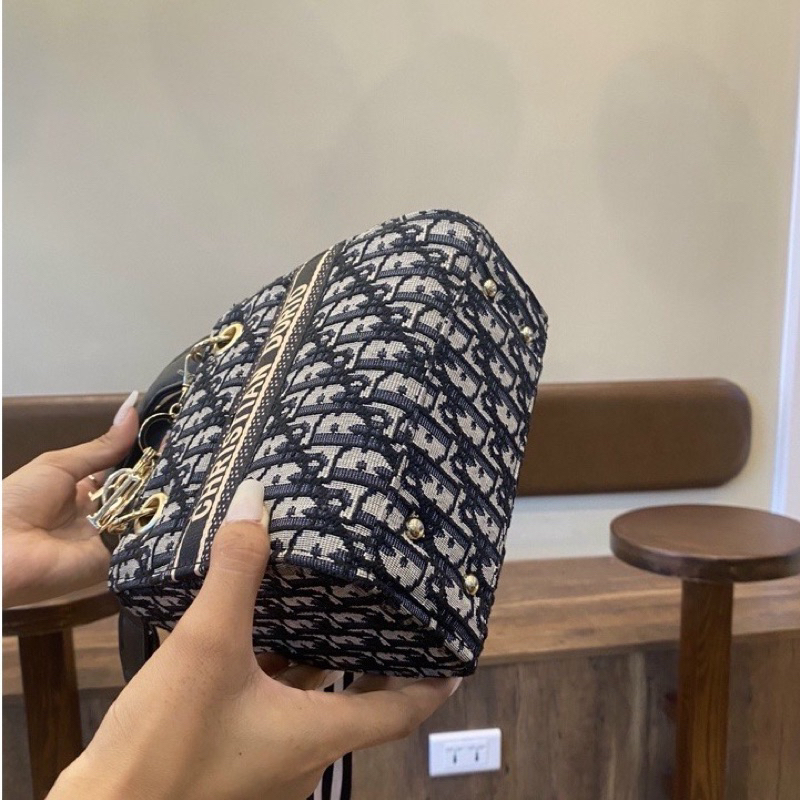 Túi đeo chéo, túi xách tay DIO THỔ CẨM PK vàng T1600