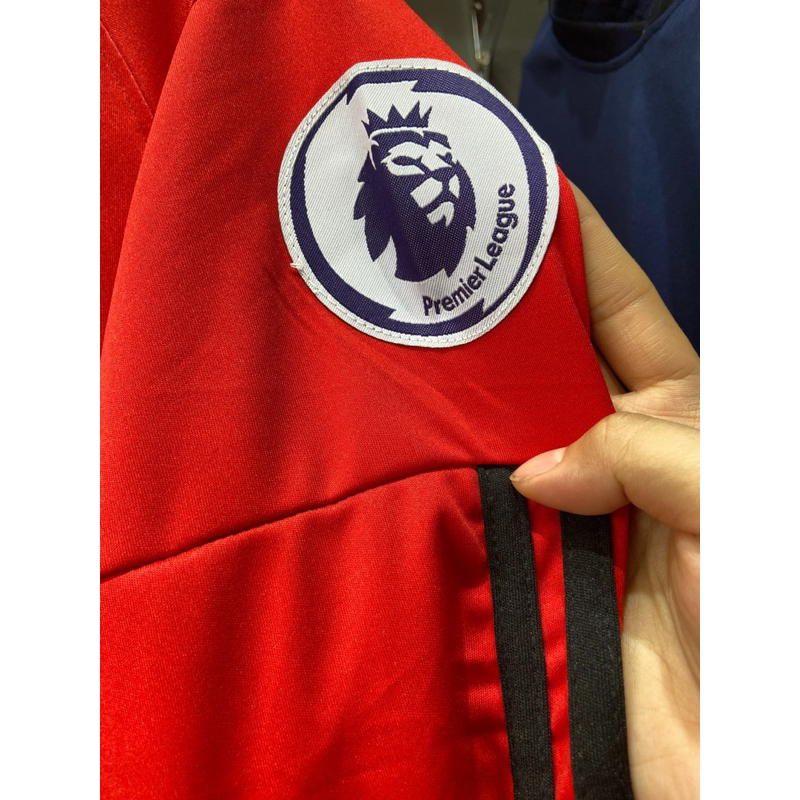 Quần áo bóng đá vải thun lạnh mẫu Mờ U màu đỏ tay dài in tên số theo yêu cầu