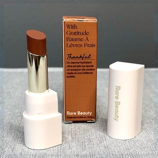 Minisize 0.75G | Son dưỡng Rare beauty With Gratitude Dewy Lip Balm có màu Thankful/nâu tây