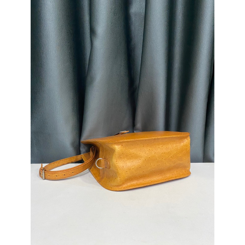 Túi si dáng độc lạ nhập Nhật da bò dập vân đà điểu