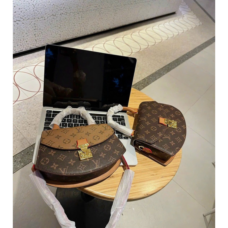 Túi L.V quai xách khoá bóp