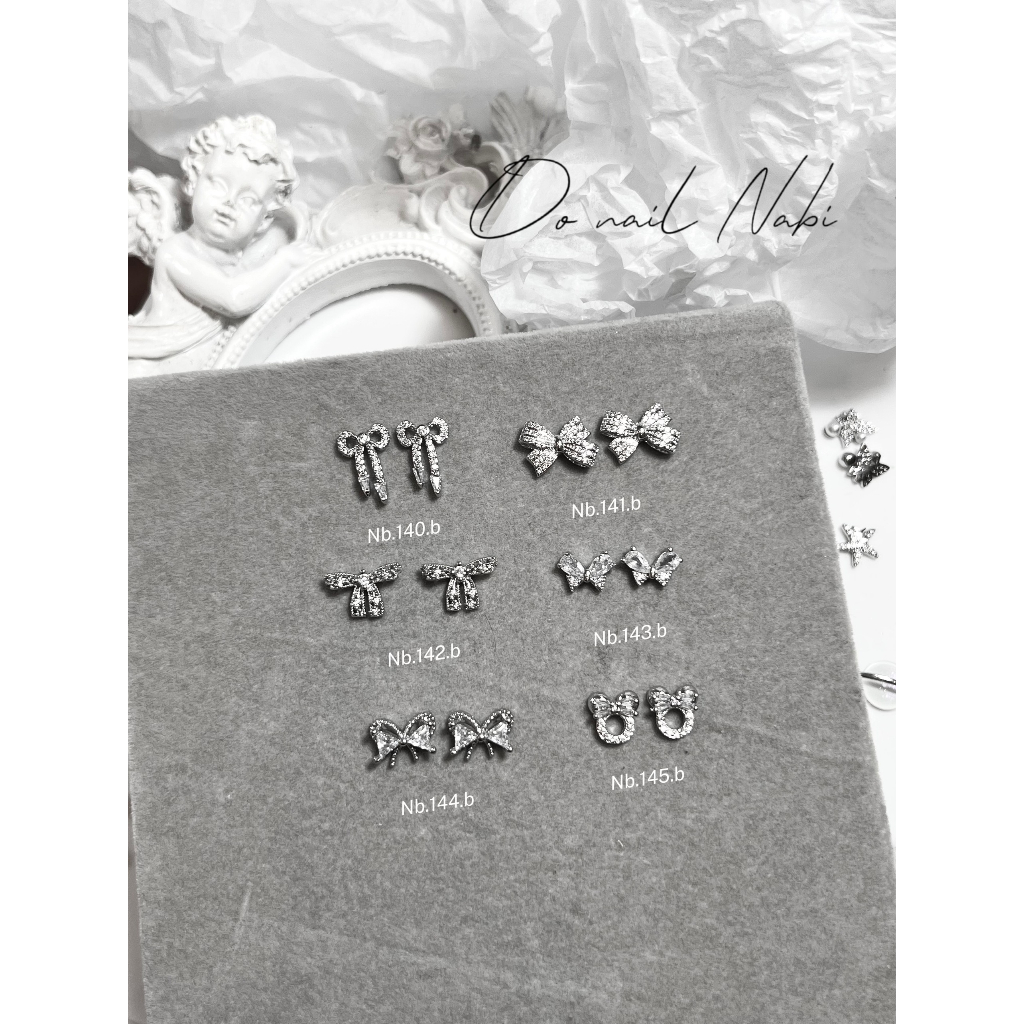 Mẫu charm nơ bạc sáng , mẫu charm nơ design móng hottrend