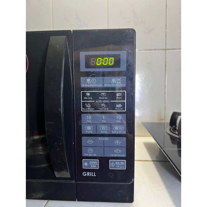 Thanh lý lò vi sóng sharp r-g572vn-b 25 lít có nướng