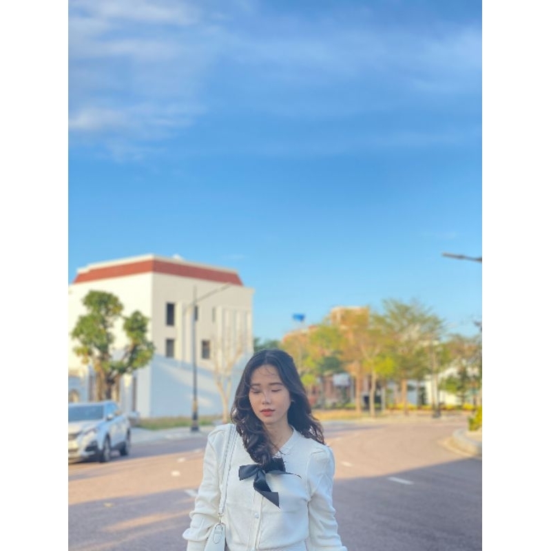 Áo cardigan có nơ đính kèm