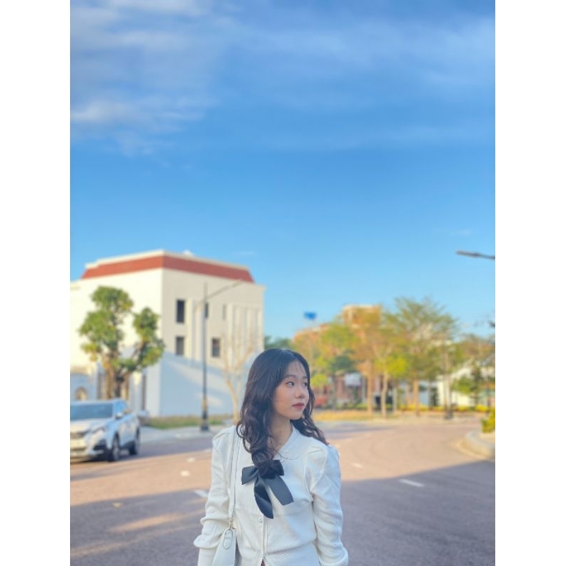 Áo cardigan có nơ đính kèm