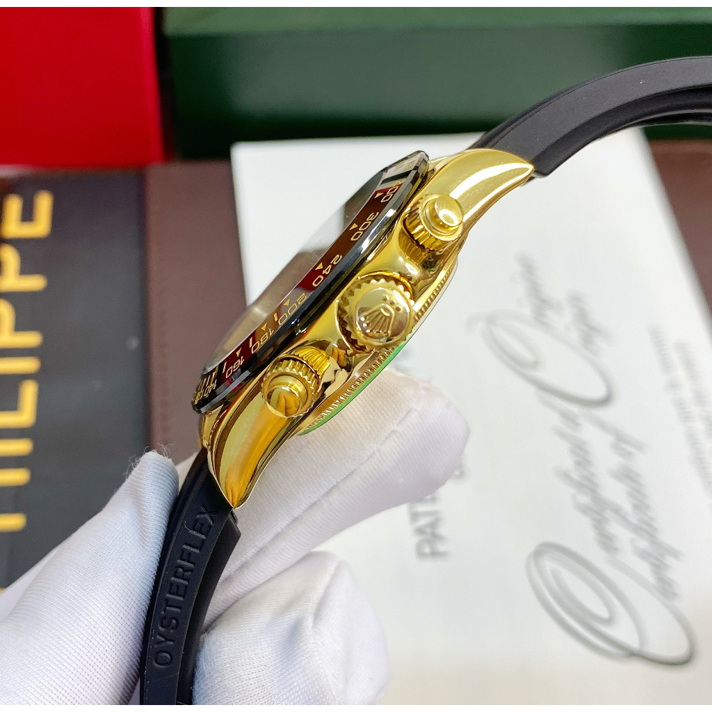 Đồng hồ Nam Rl 6kim daytona mặt đen số đá vỏ vàng gold dây cao su 40mm dòng cơ Automatic