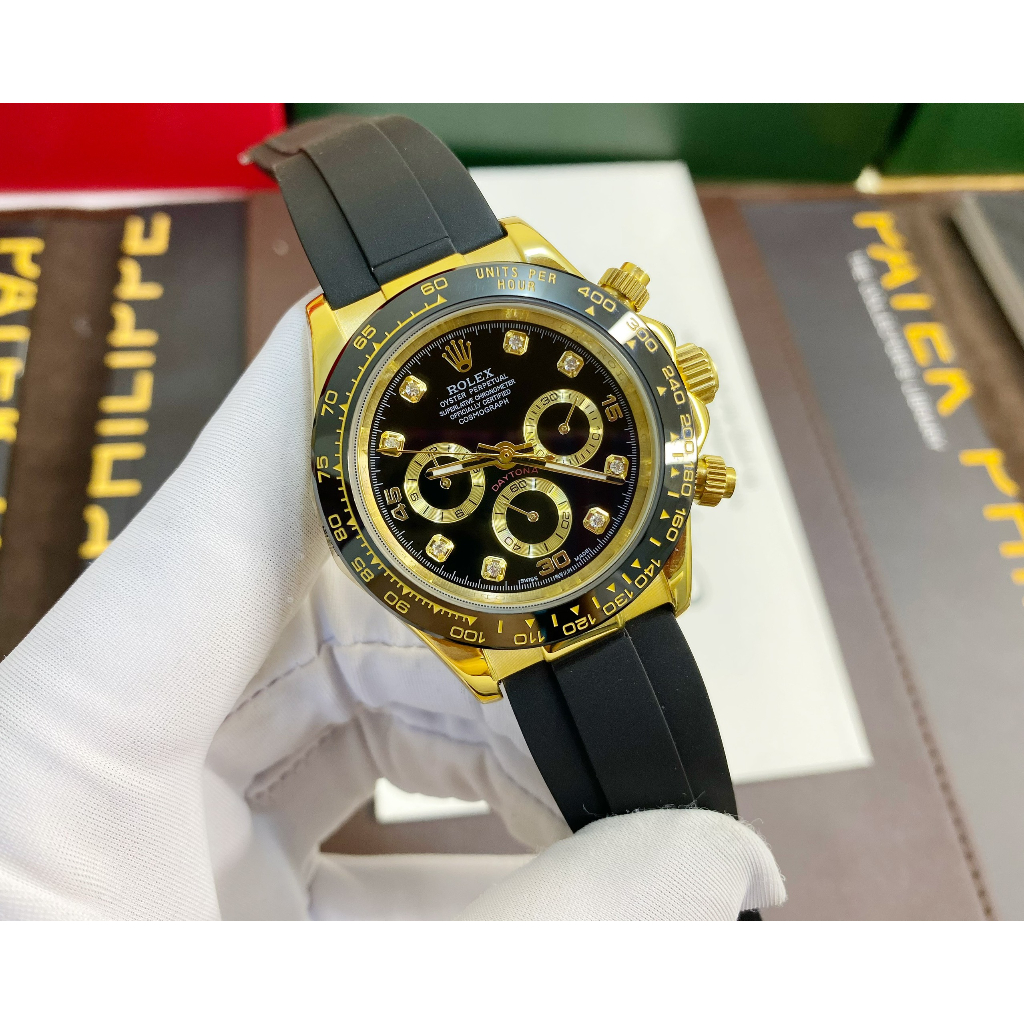 Đồng hồ Nam Rl 6kim daytona mặt đen số đá vỏ vàng gold dây cao su 40mm dòng cơ Automatic