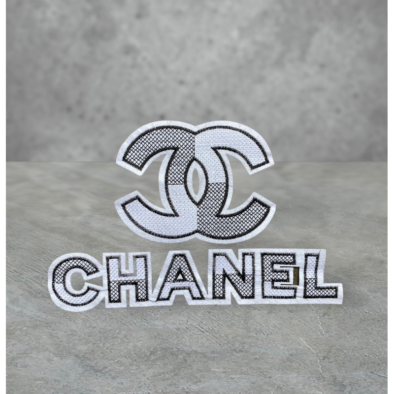 sticker logo thêu X CHANE.L to đẹp ủi nhiệt