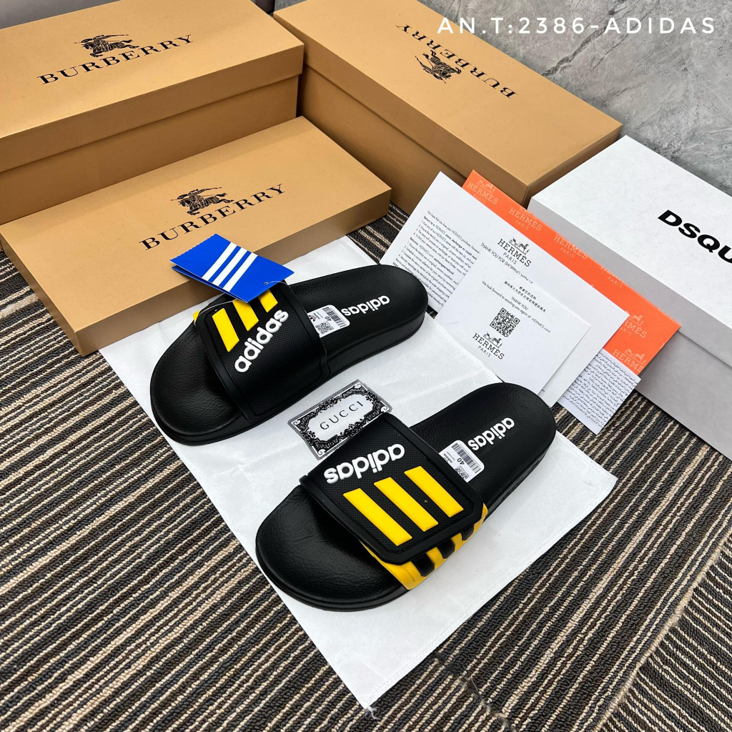 Dép adidas quai khâu mẫu mới 3 sọc 2 màu đen vàng - new 2023