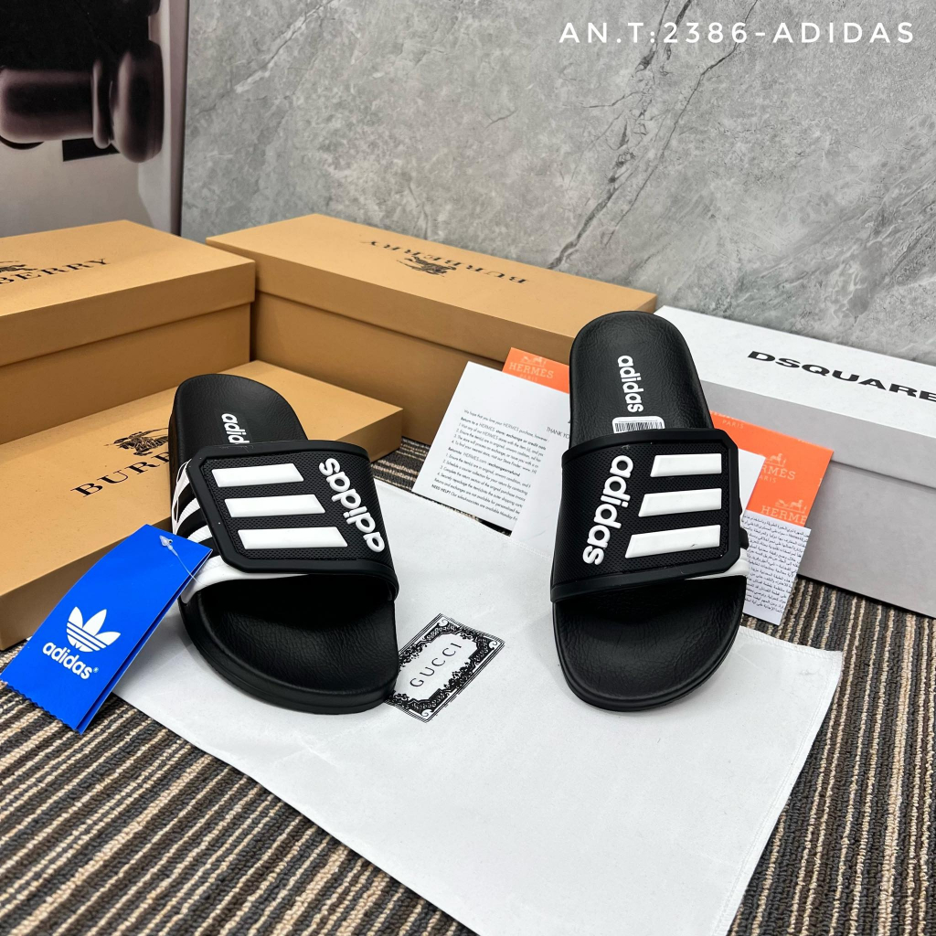 Dép adidas quai khâu mẫu mới 3 sọc 2 màu đen vàng - new 2023