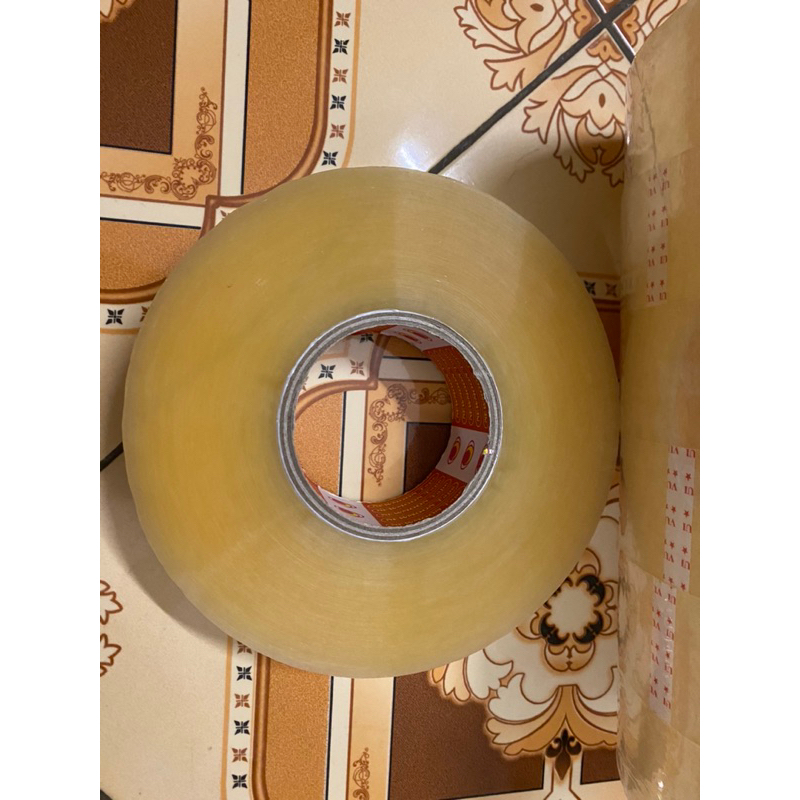 Băng dính dán thùng lõi giấy mỏng 1kg/1cuộn