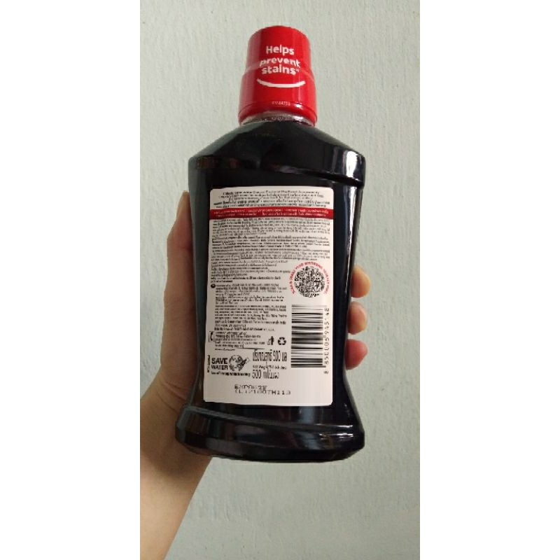 Nước súc miệng Colgate Trắng Răng Optic White Than Hoạt Tính Bạc Hà The Mát 500ml