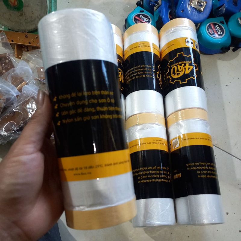 Nilong che bụi, che sơn, che đa năng có băng dính dán