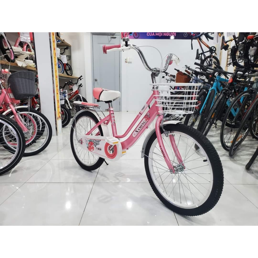 Xe đạp trẻ em xe đạp Shopvietnam cỡ 18/20 inch cho bé gái từ 7 tới 10 tuổi có giỏ xe có baga