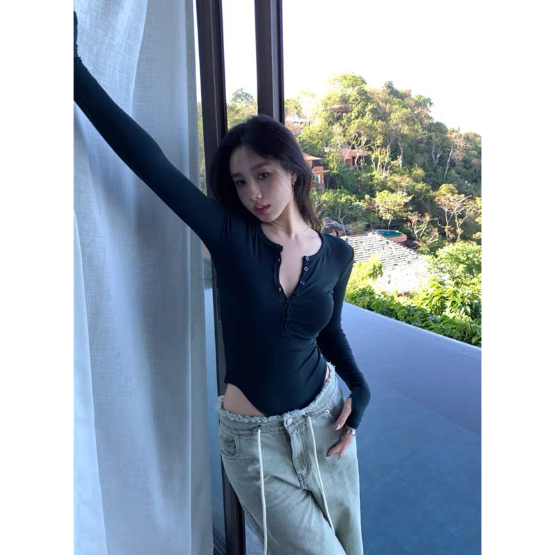 Jumpsuit dài tay co giãn dệt kim