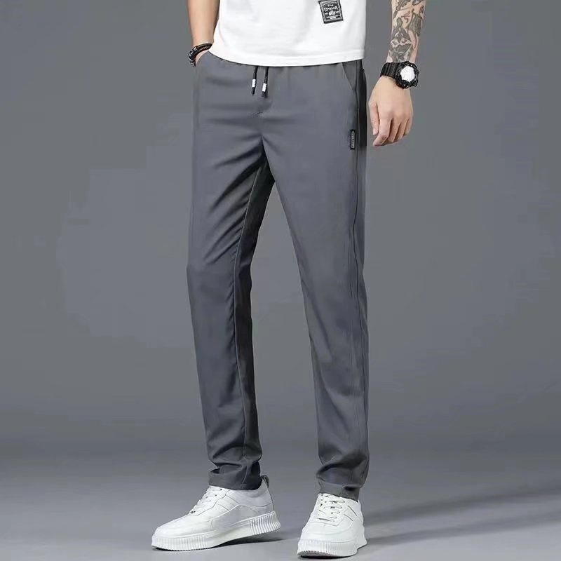 Quần dài thể thao nam ống suông nhẹ chất poly co giãn