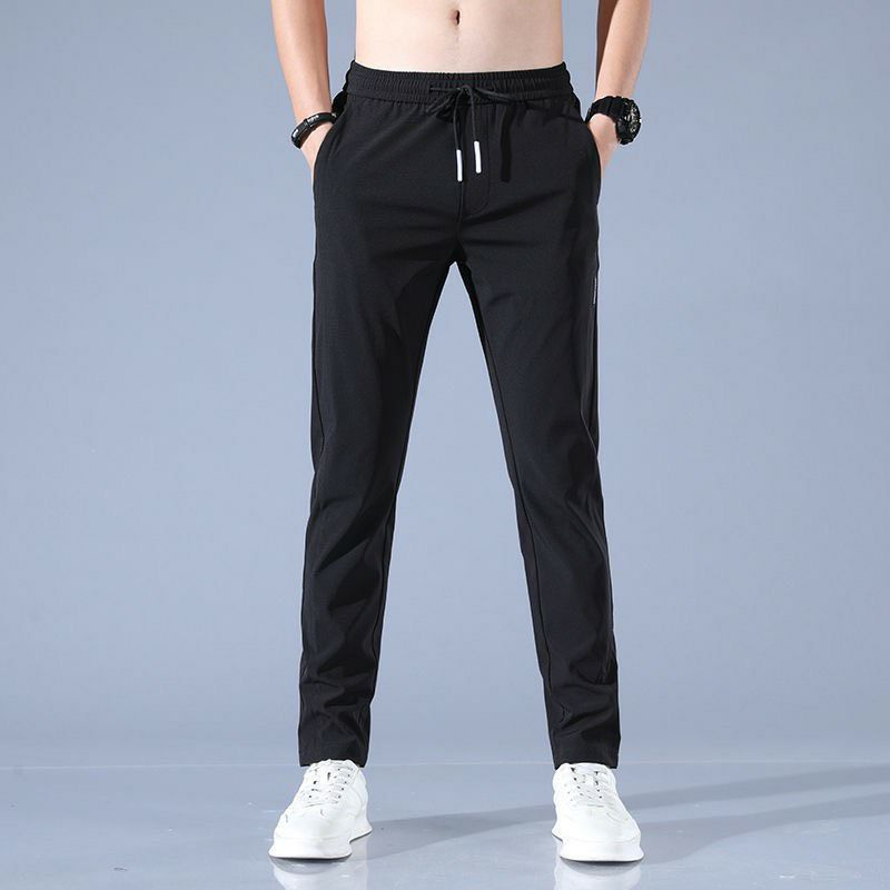 Quần dài thể thao nam ống suông nhẹ chất poly co giãn