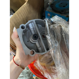 nắp bơm hơi , nắp b máy xúc lật