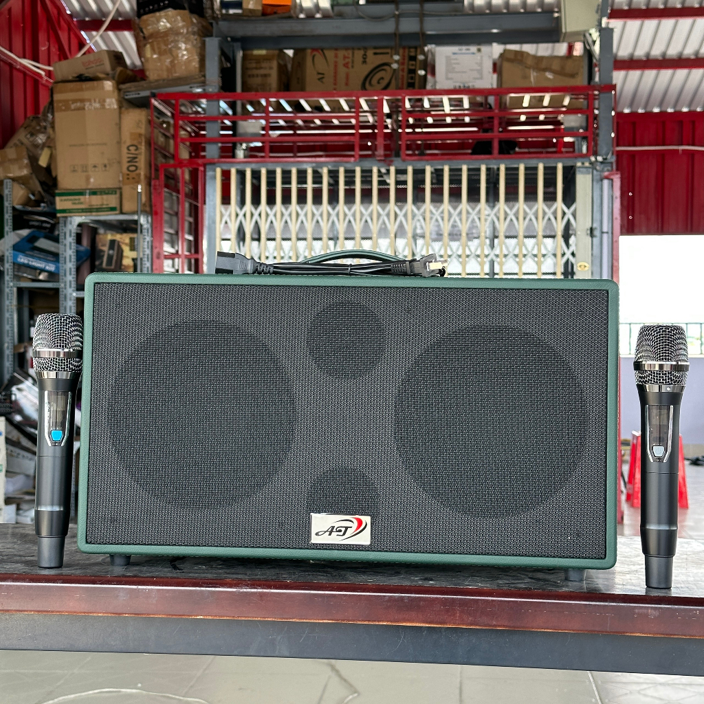 Loa karaoke xách tay AT T18 PRO di động công suất lớn 300w kèm 2 micro bass mạnh hút âm cực hay đủ echo reverb