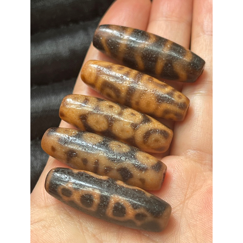 Dzi tây tạng  Đá phong thuỷ mang lại may mắn: dzi màu cam nhiều mẫu phong hoá lên vảy rồng rất mê li