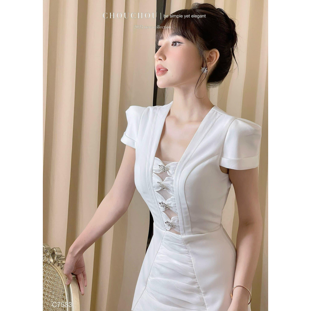 Đầm nút đá tay phồng