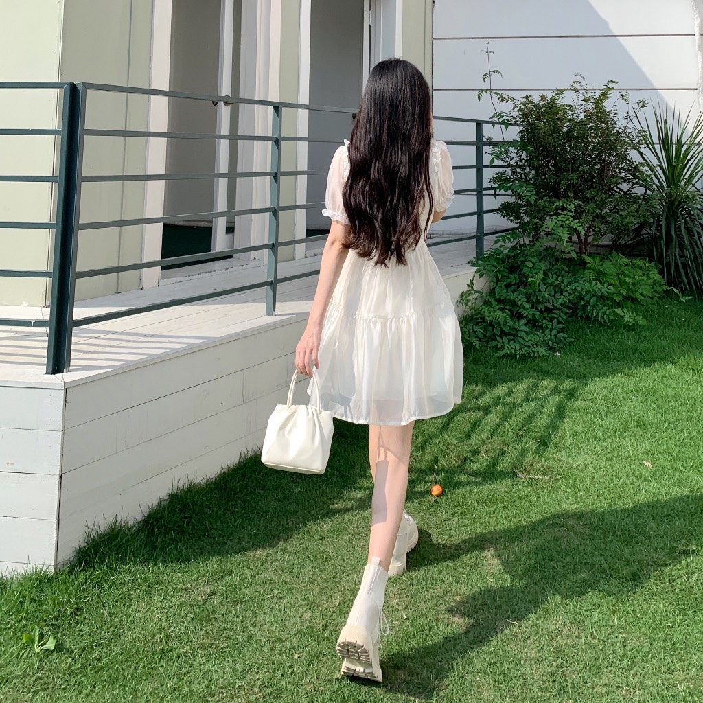 Váy Voan Cổ Bèo Cúc Ngọc Thắt Dây Nơ Dáng Xoè Màu Kem Mặc Đi Chơi