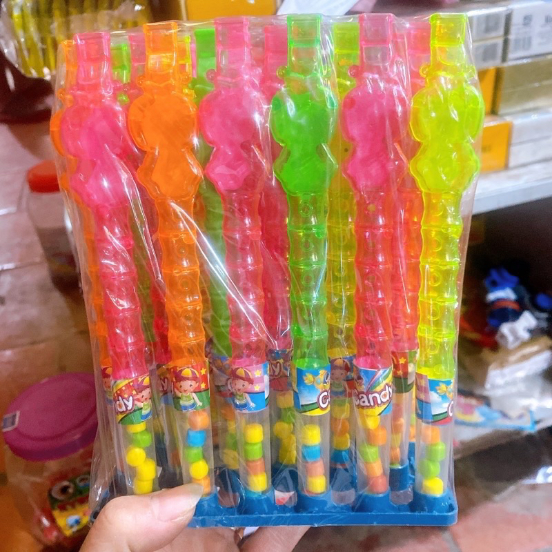 sỉ lốc 30 lọ kẹo xê kèm đồ chơi sáo nhựa trong