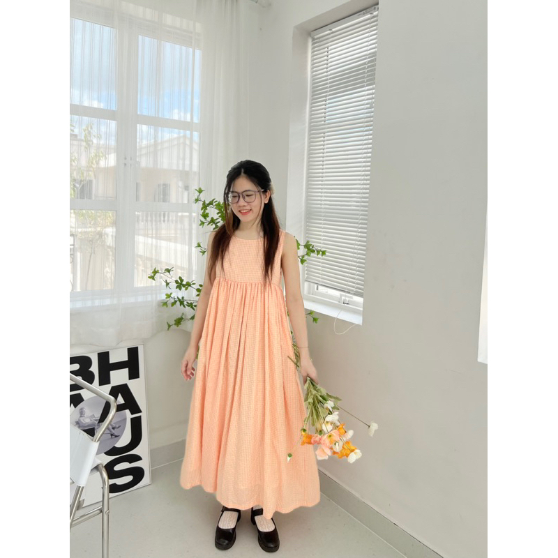 Váy thắt nơ lưng caro cam đào