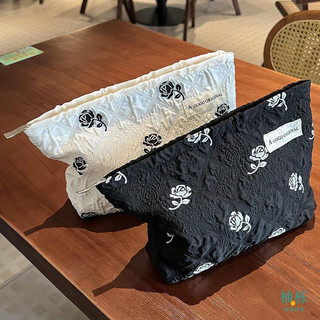Túi đựng mỹ phẩm có dây kéo họa tiết hình hoa màu trắng đen sang trọng 26x19cm