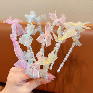 Bờm ngọc phối nơ xinh xắn cho bé gái