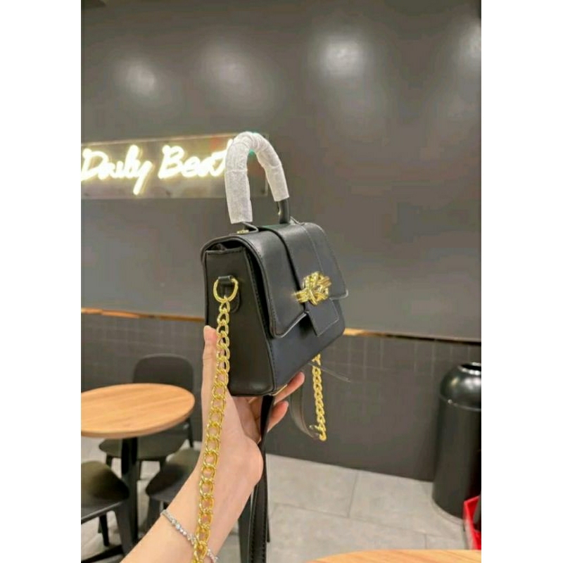 Túi mã lạ da tăm