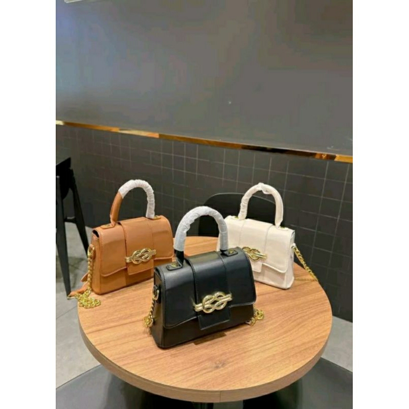 Túi mã lạ da tăm