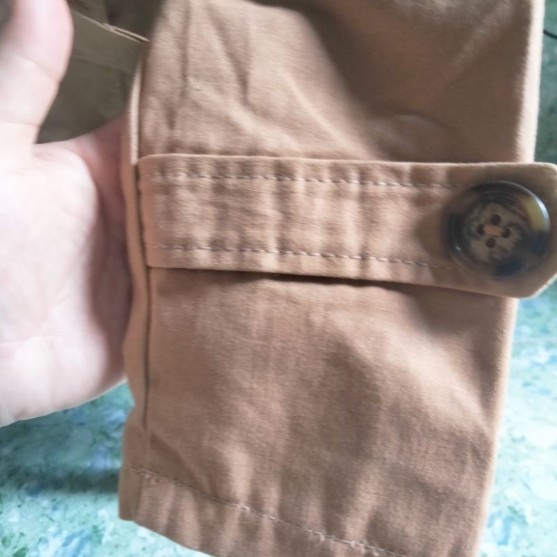 Áo khoác new mất tem còn chua cắt khuy