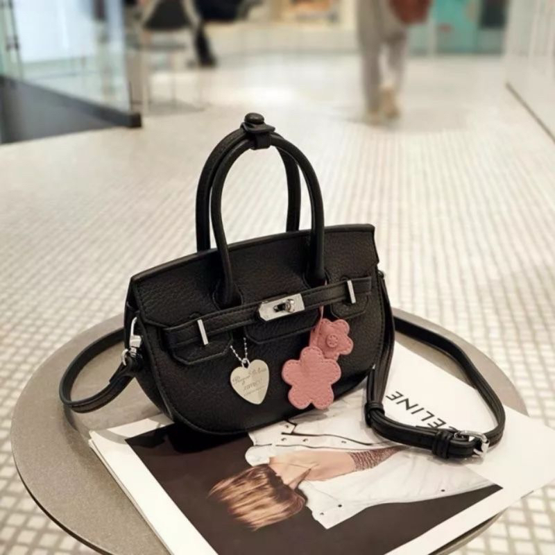 Túi xách nữ cầm tay, túi đeo chéo khoá xoay sang chảnh