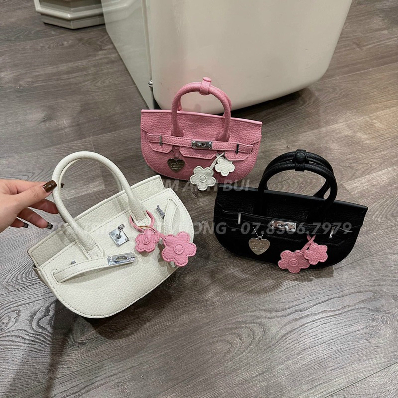 Túi xách nữ cầm tay, túi đeo chéo khoá xoay sang chảnh