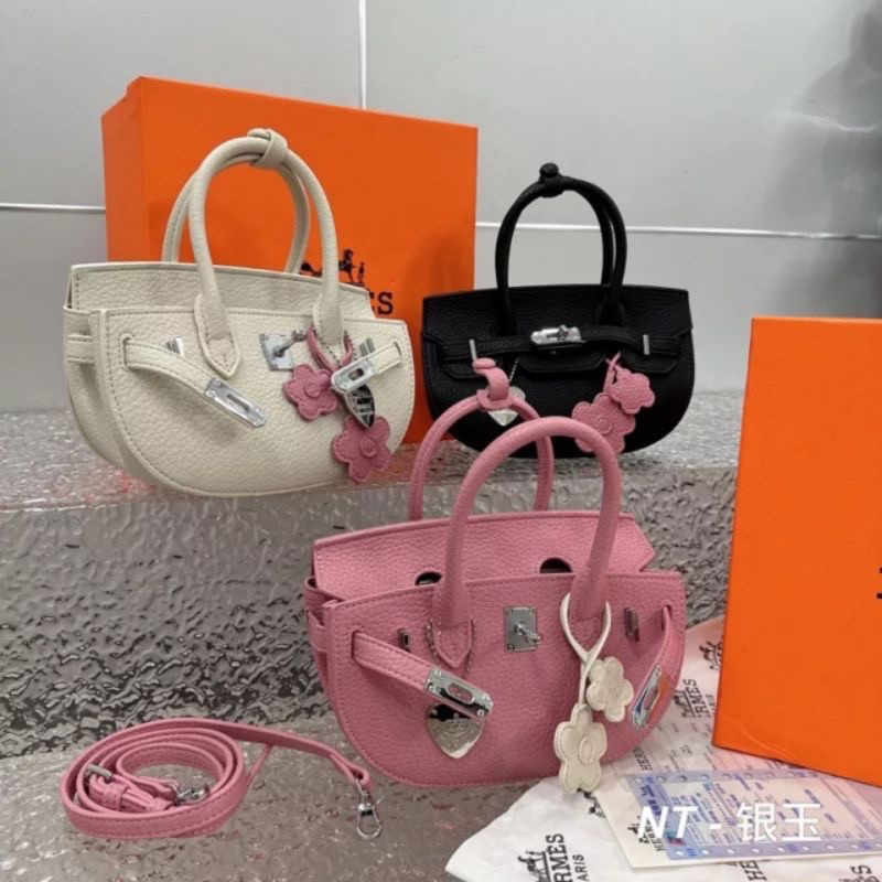 Túi xách nữ cầm tay, túi đeo chéo khoá xoay sang chảnh