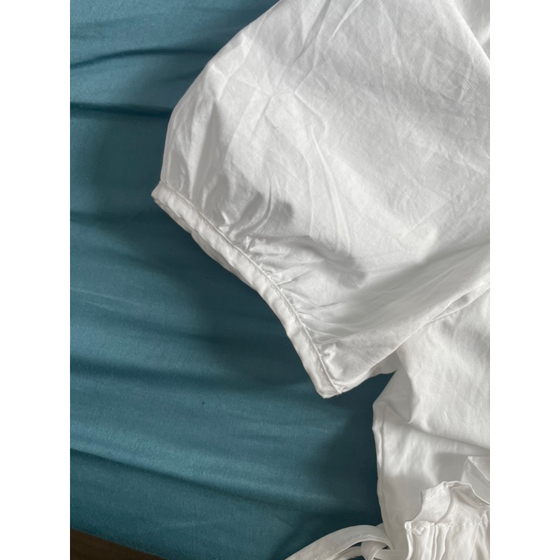 Đầm babydoll trắng tay bồng freesize