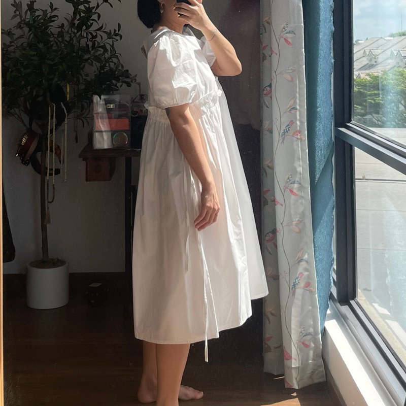 Đầm babydoll trắng tay bồng freesize