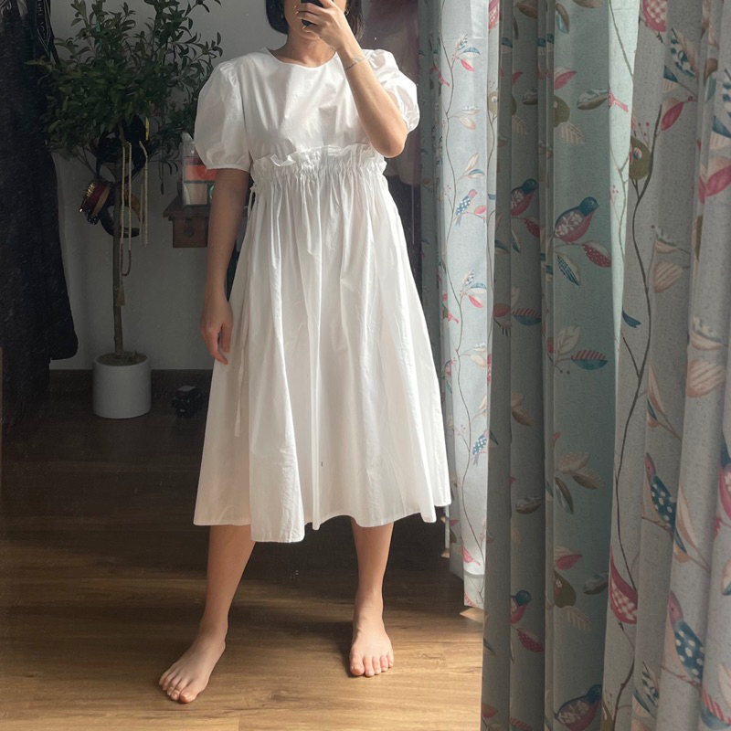 Đầm babydoll trắng tay bồng freesize