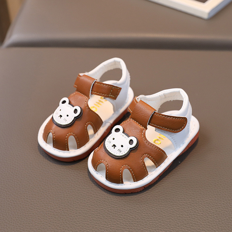Dép sandal tập đi cho bé gái bé trai có kèn đế êm chống trơn chống trượt gắn hình Gấu kute