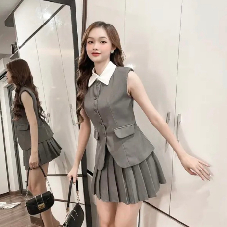 Set áo gile cổ vest mix chân váy xếp ly -TInahouse.2021