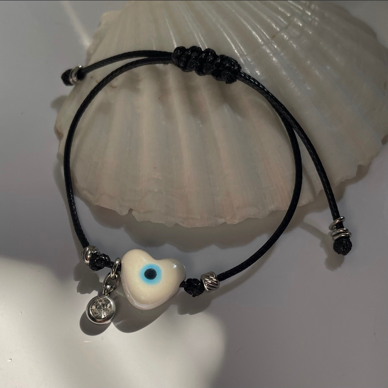 Vòng tay mặt mắt quỷ ngôi sao-trái tim bằng sứ Madde/2985