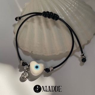 vòng tay trái tim bằng gốm với charm zircon bằng thép titan Madde