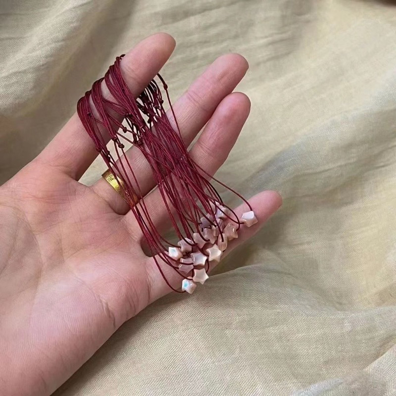 Vòng tay chỉ đỏ may mắn mix charm xà cừ