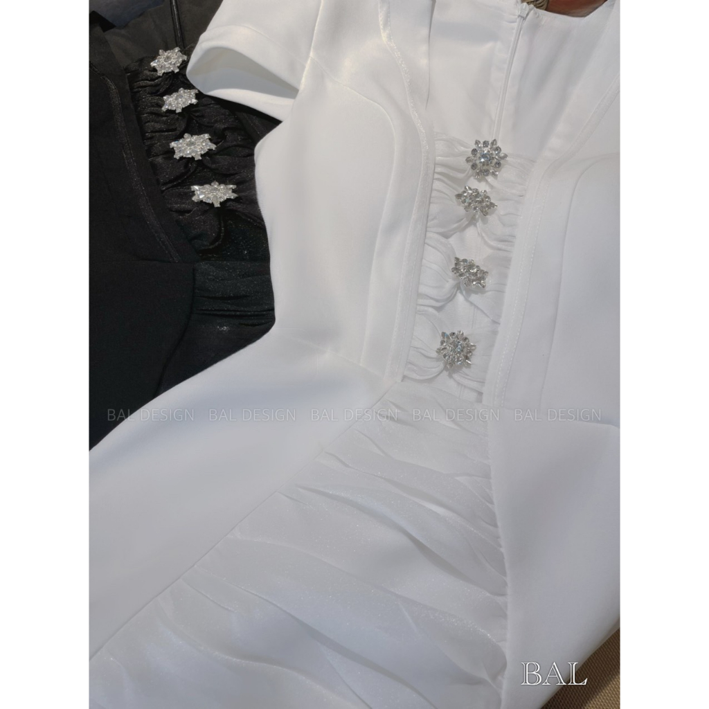 Váy thiết kế tay phồng nơ đính đá