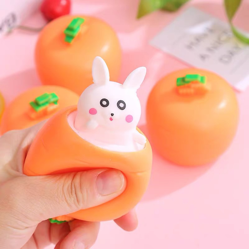 Đồ chơi thỏ trốn cà rốt - Squishy Mochi Pop up Squirrel