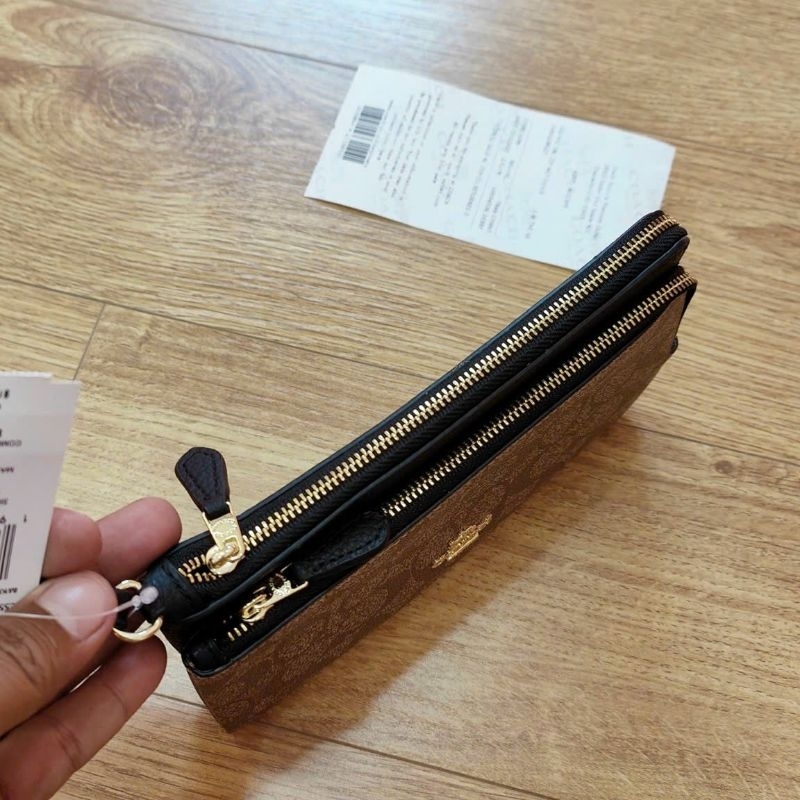 Ví C0ach cầm tay siêu sang