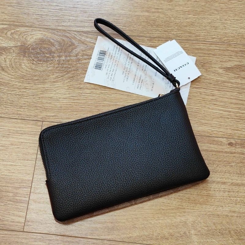 Ví C0ach cầm tay siêu sang