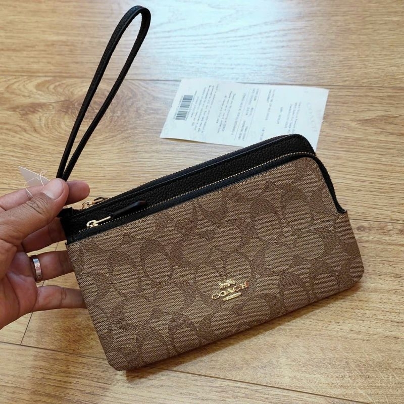 Ví C0ach cầm tay siêu sang